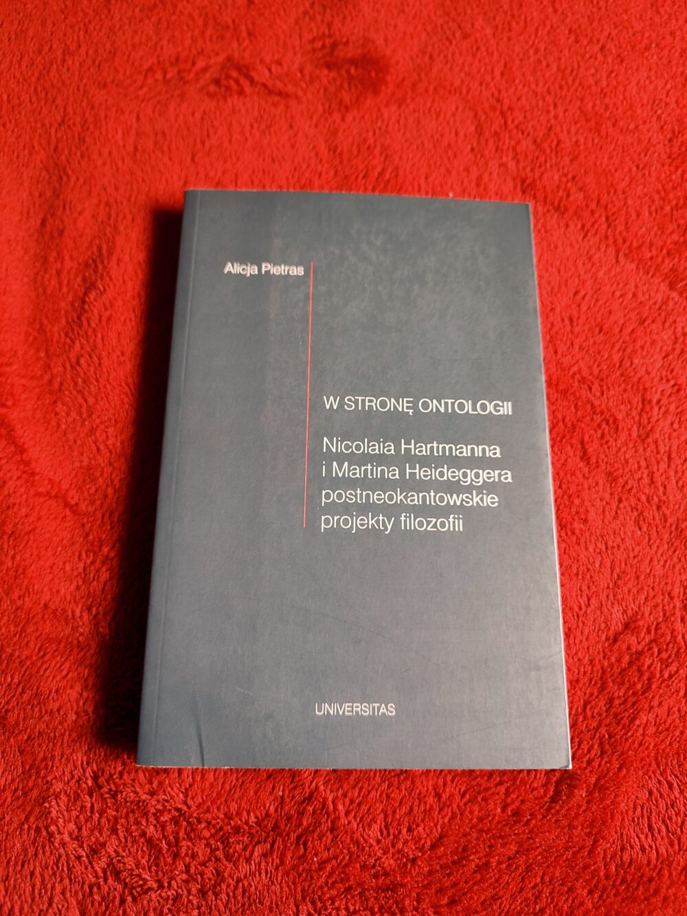 Alicja Pietras, "W stronę ontologii. Nicolaia Hartmanna i Martina Heideggera postneokantowskie projekty filozofii" [2012]